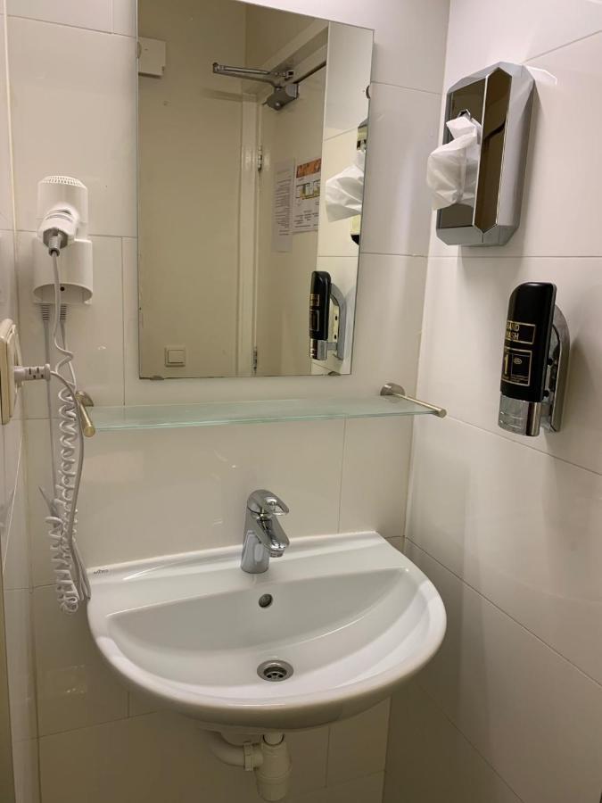 אמסטרדם Dam Hotel מראה חיצוני תמונה